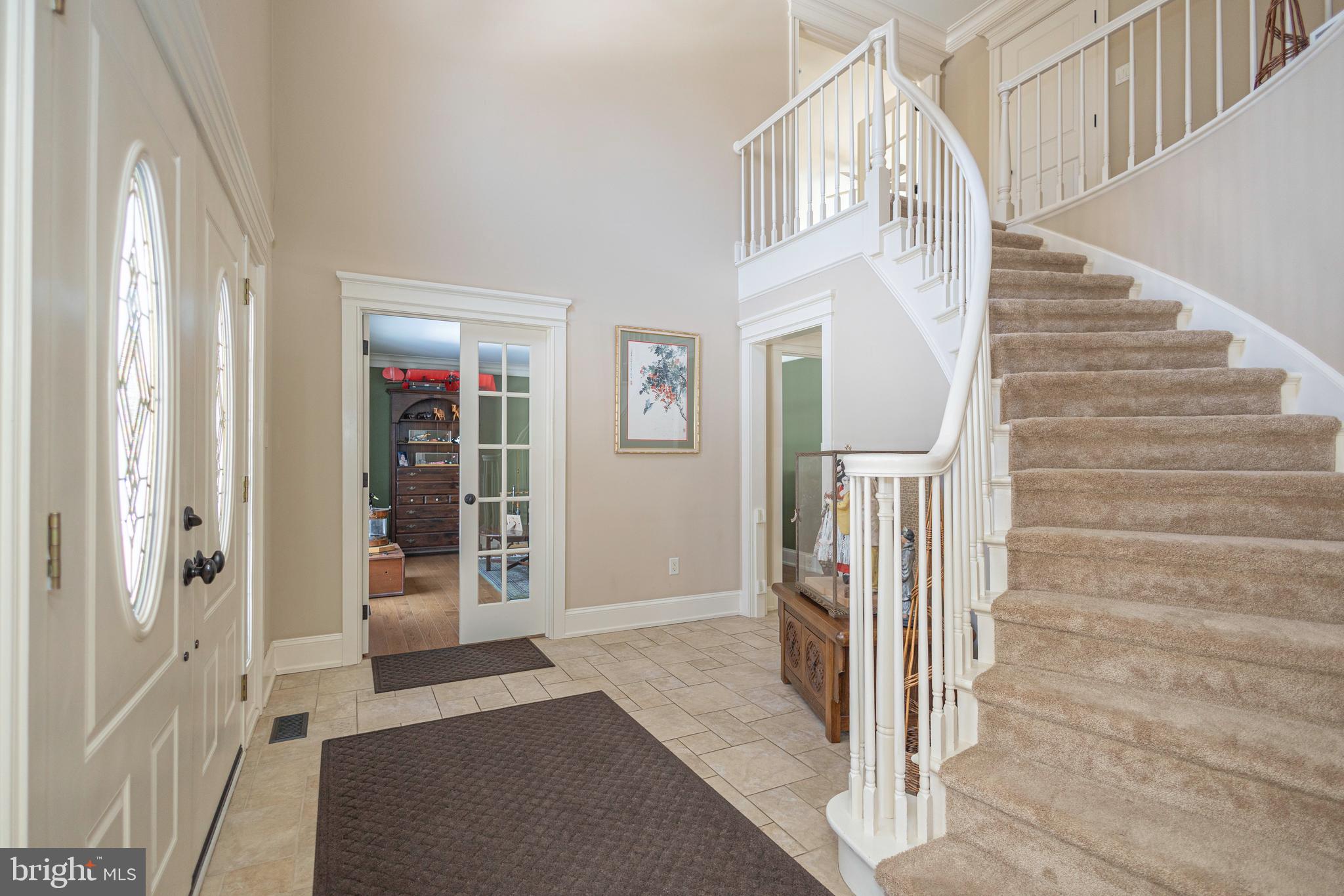 196 Aqueduct Road Washington Crossing, PA 18977 - Photo 3 of 57 a view of entryway and hall with wooden floor