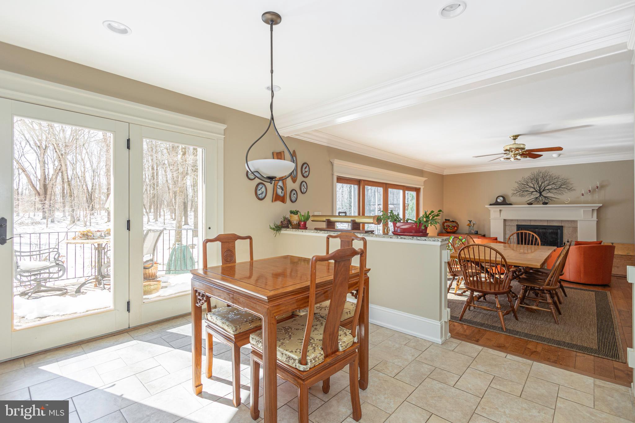 196 Aqueduct Road Washington Crossing, PA 18977 - Photo 32 of 57 a dining room with furniture a chandelier and wooden floor