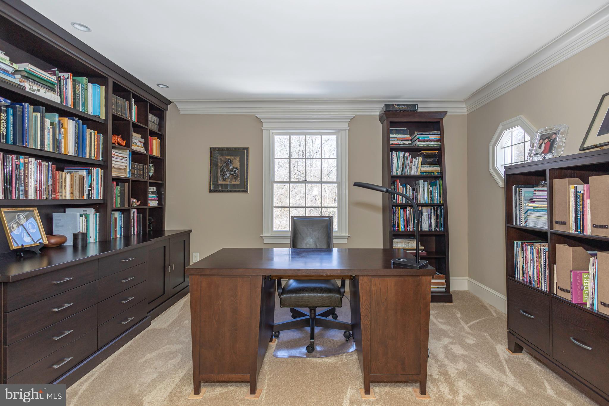 196 Aqueduct Road Washington Crossing, PA 18977 - Photo 40 of 57 a view of a workspace with bookshelf