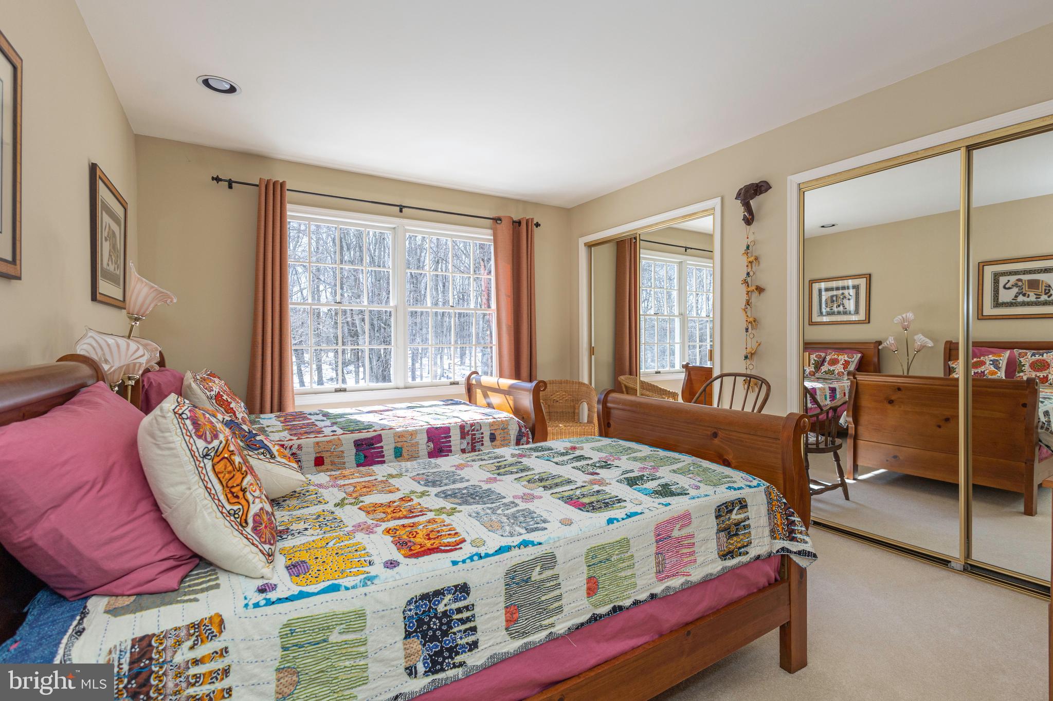 196 Aqueduct Road Washington Crossing, PA 18977 - Photo 51 of 57 a bedroom with a bed and large windows