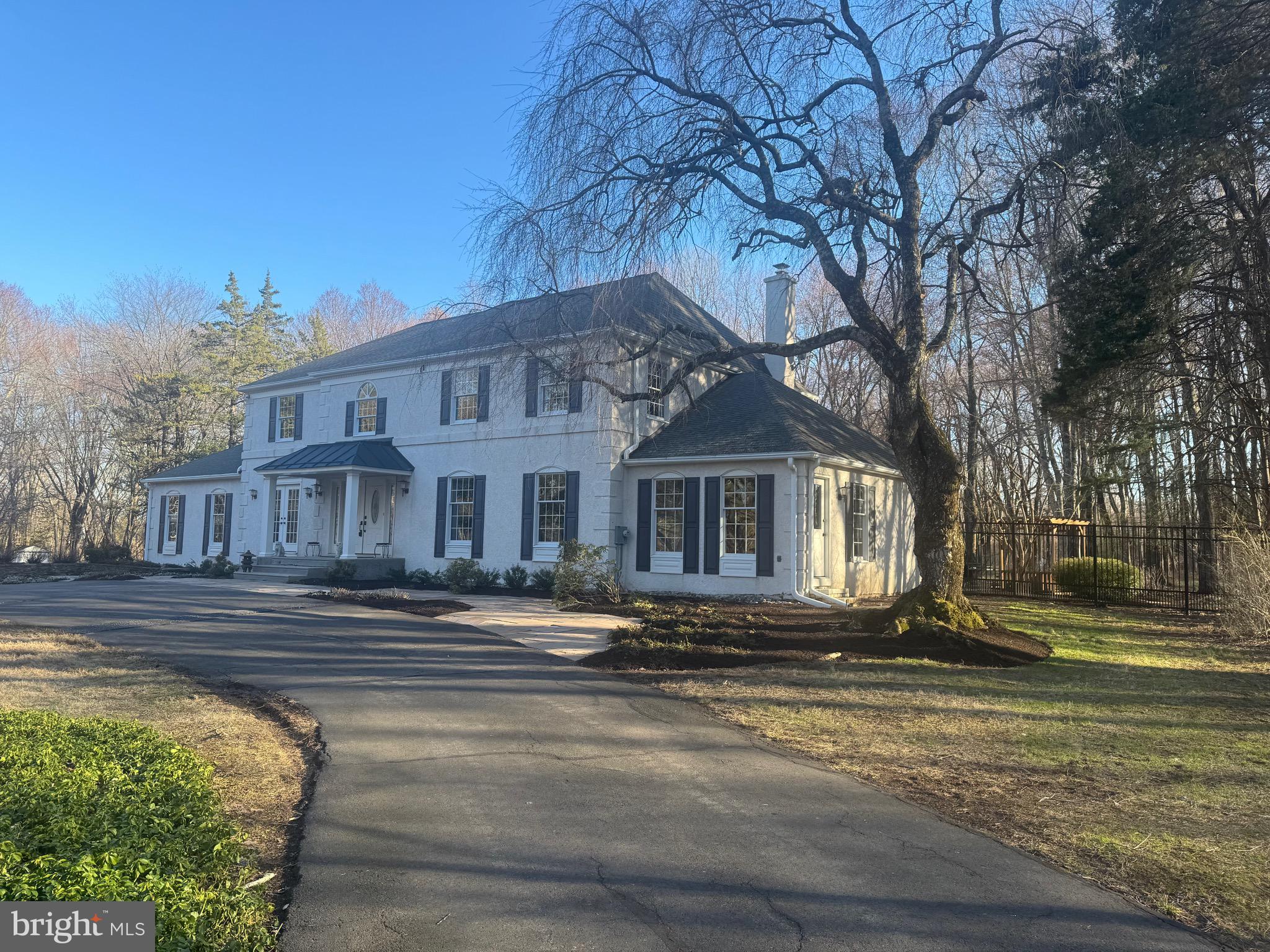 196 Aqueduct Road Washington Crossing, PA 18977 - Photo 56 of 57 a front view of a house with a yard
