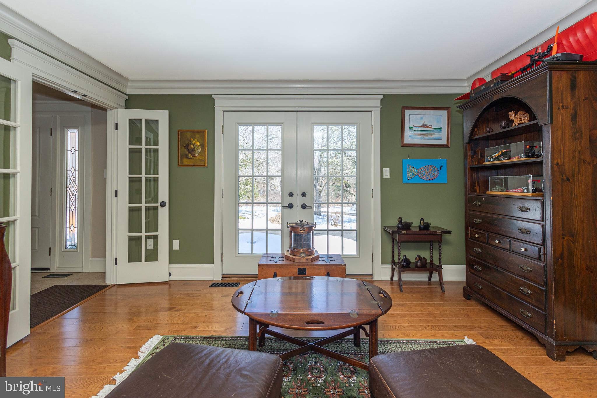 196 Aqueduct Road Washington Crossing, PA 18977 - Photo 8 of 57 a living room with furniture and a window