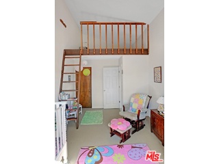 2717 Halsey Road Topanga, CA 90290 - Photo 14 of 39 a living room with furniture and floor to ceiling window