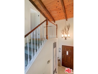 2717 Halsey Road Topanga, CA 90290 - Photo 20 of 39 a view of a hallway with wooden floor