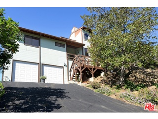 2717 Halsey Road Topanga, CA 90290 - Photo 3 of 39 a view of a house with a yard