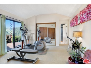 2717 Halsey Road Topanga, CA 90290 - Photo 9 of 39 a view of a livingroom with furniture and windows