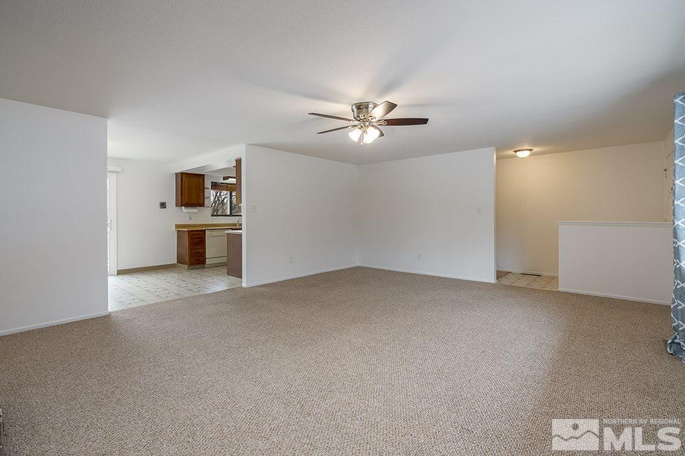 2235 Trentham Way Reno, NV 89509 - Photo 4 of 13 a view of empty room with a ceiling fan