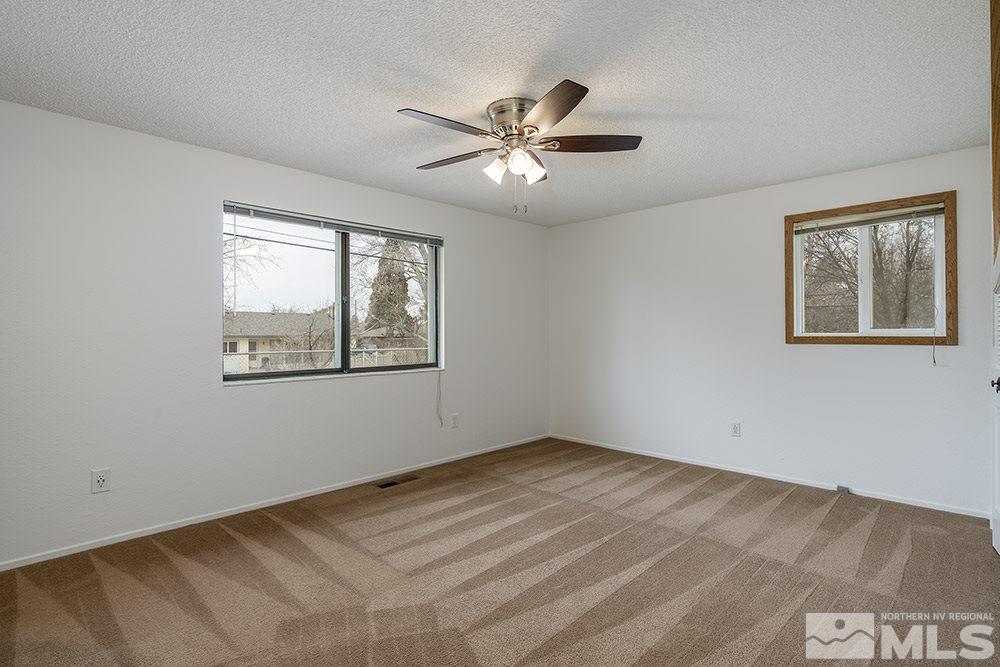 2235 Trentham Way Reno, NV 89509 - Photo 10 of 13 a view of an empty room with a window