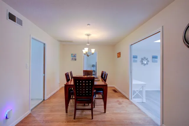 a view of a dining room with furniture