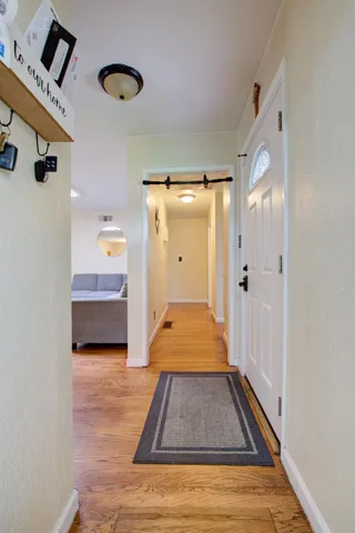 a spacious bathroom with a sink a vanity and a mirror