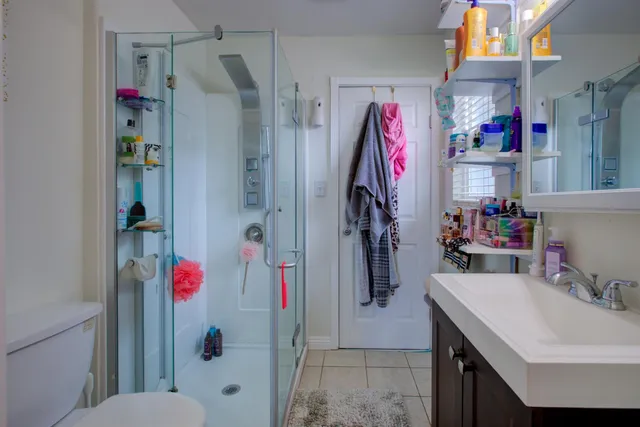 a bathroom with a sink and mirror