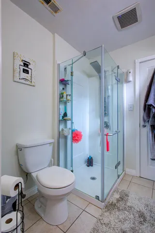 a view of a house with swimming pool and a yard