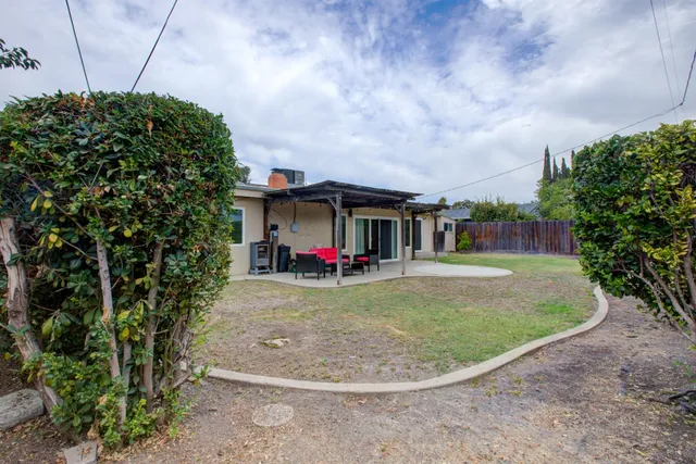 an aerial view of residential houses and garden
