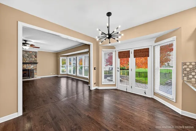 a kitchen with stainless steel appliances a refrigerator sink and cabinets