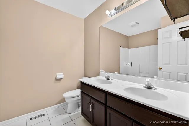 a bathroom with a tub and shower