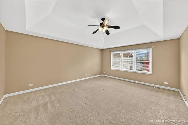 a bathroom with a toilet and a vanity