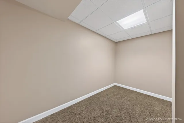 an aerial view of a house having yard