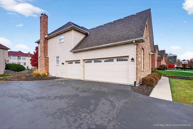 a view of entryway with wooden floor and stairs