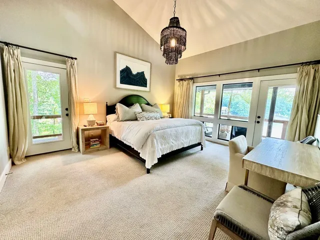 a bathroom with a sink double vanity and a shower
