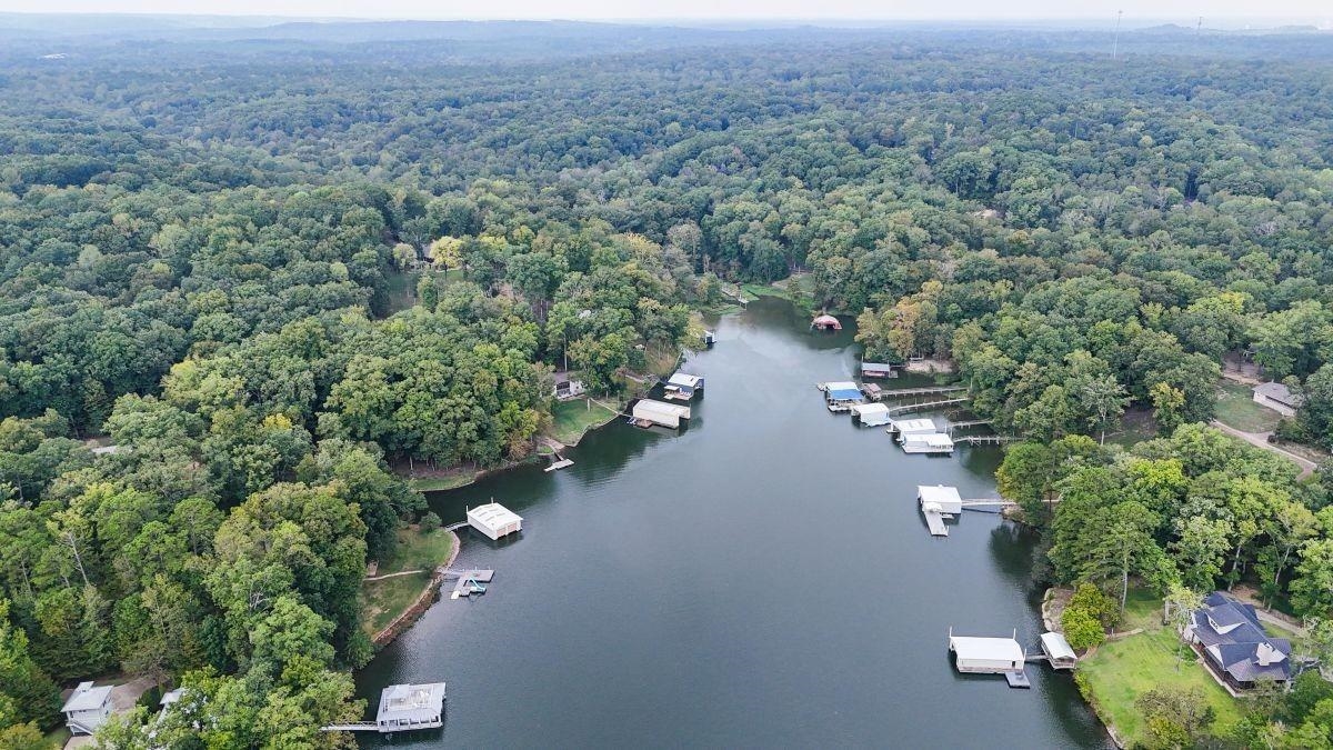 150 Turley Lane Counce, TN 38326 - Photo 3 of 35 an aerial view of a house with a yard and lake view