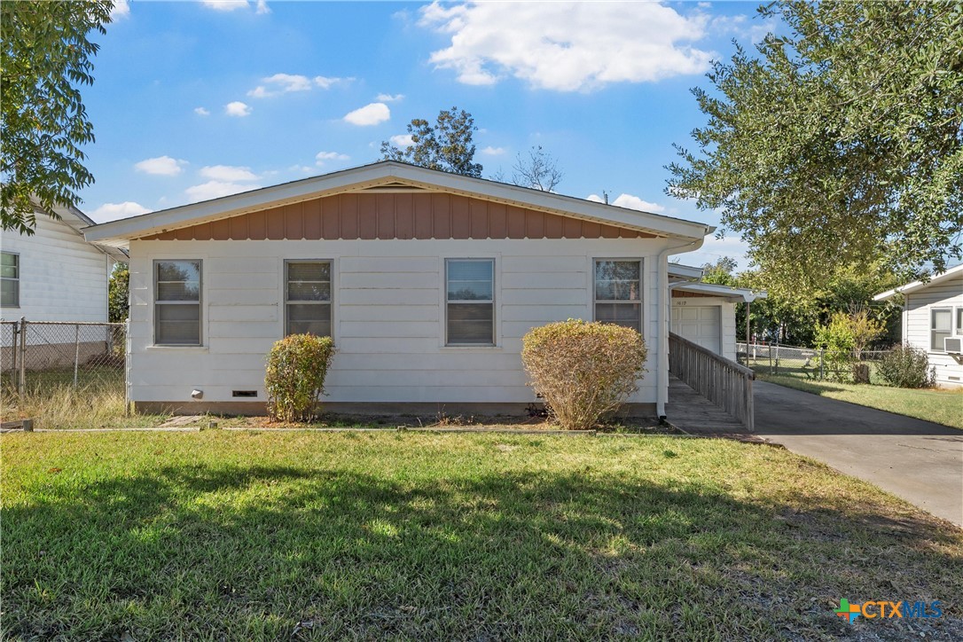 1612 South 49th Street Temple, TX 76504 - Photo 2 of 24 a view of a house with backyard and garden