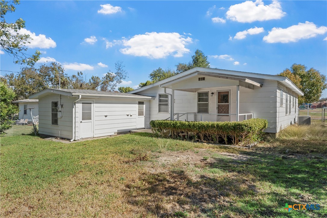 1612 South 49th Street Temple, TX 76504 - Photo 21 of 24 a front view of a house with a yard