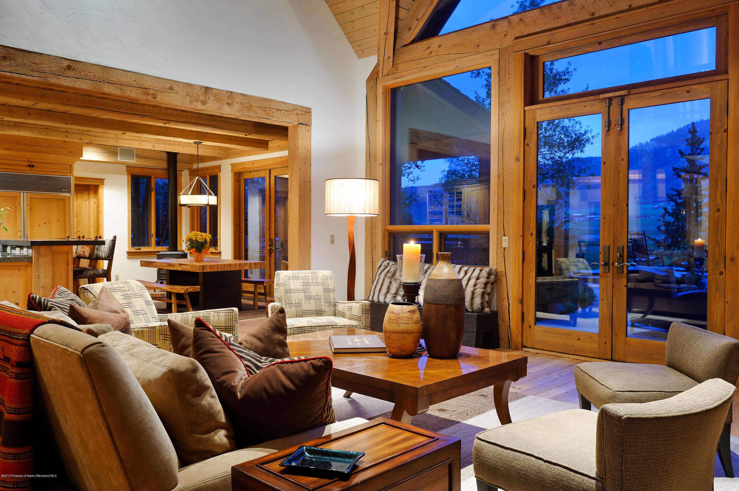 298 Red Rock Road Basalt, CO 81621 - Photo 12 of 30 a living room with furniture a lamp and large window