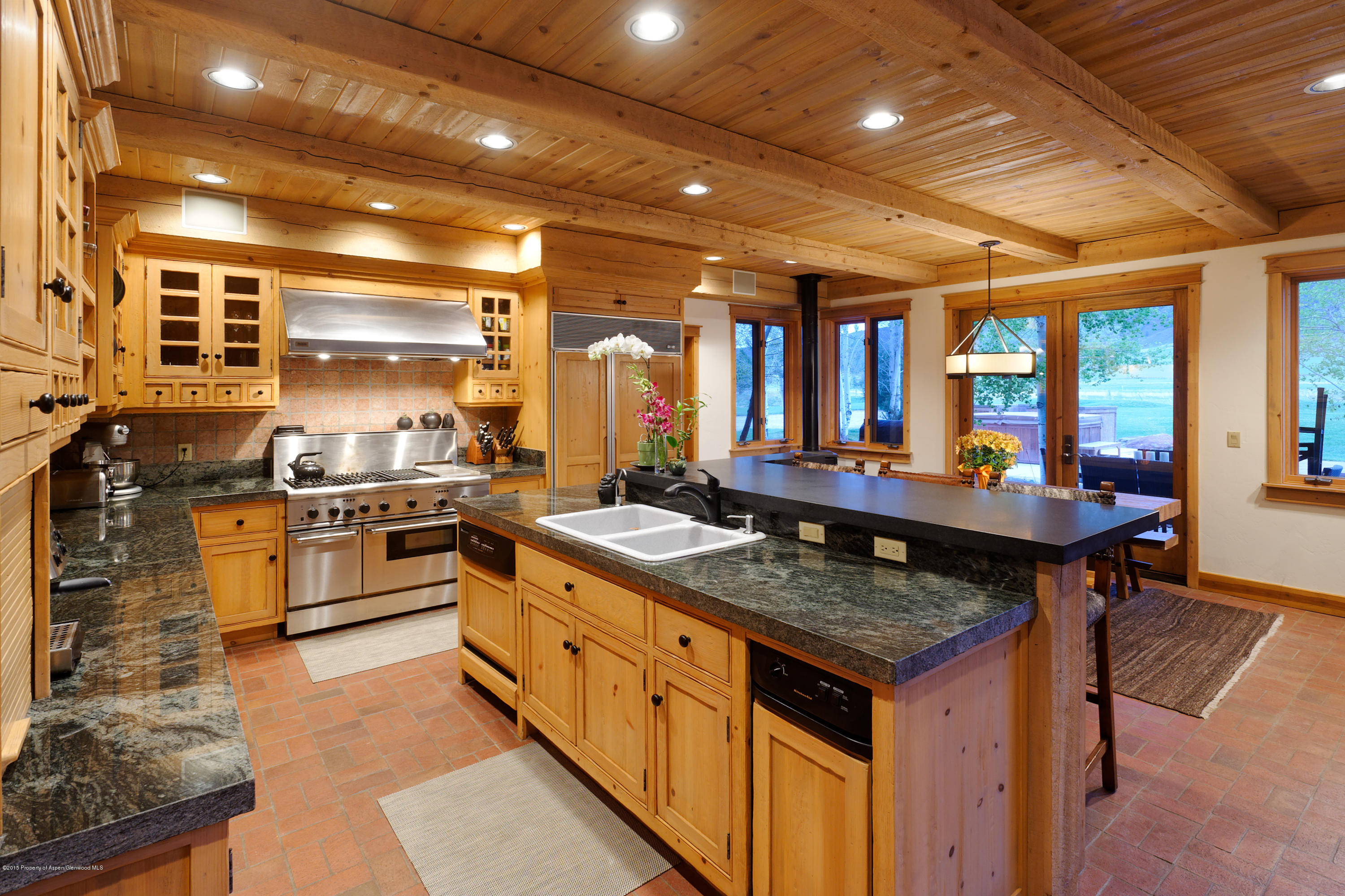 298 Red Rock Road Basalt, CO 81621 - Photo 13 of 30 a kitchen with granite countertop lots of counter top space