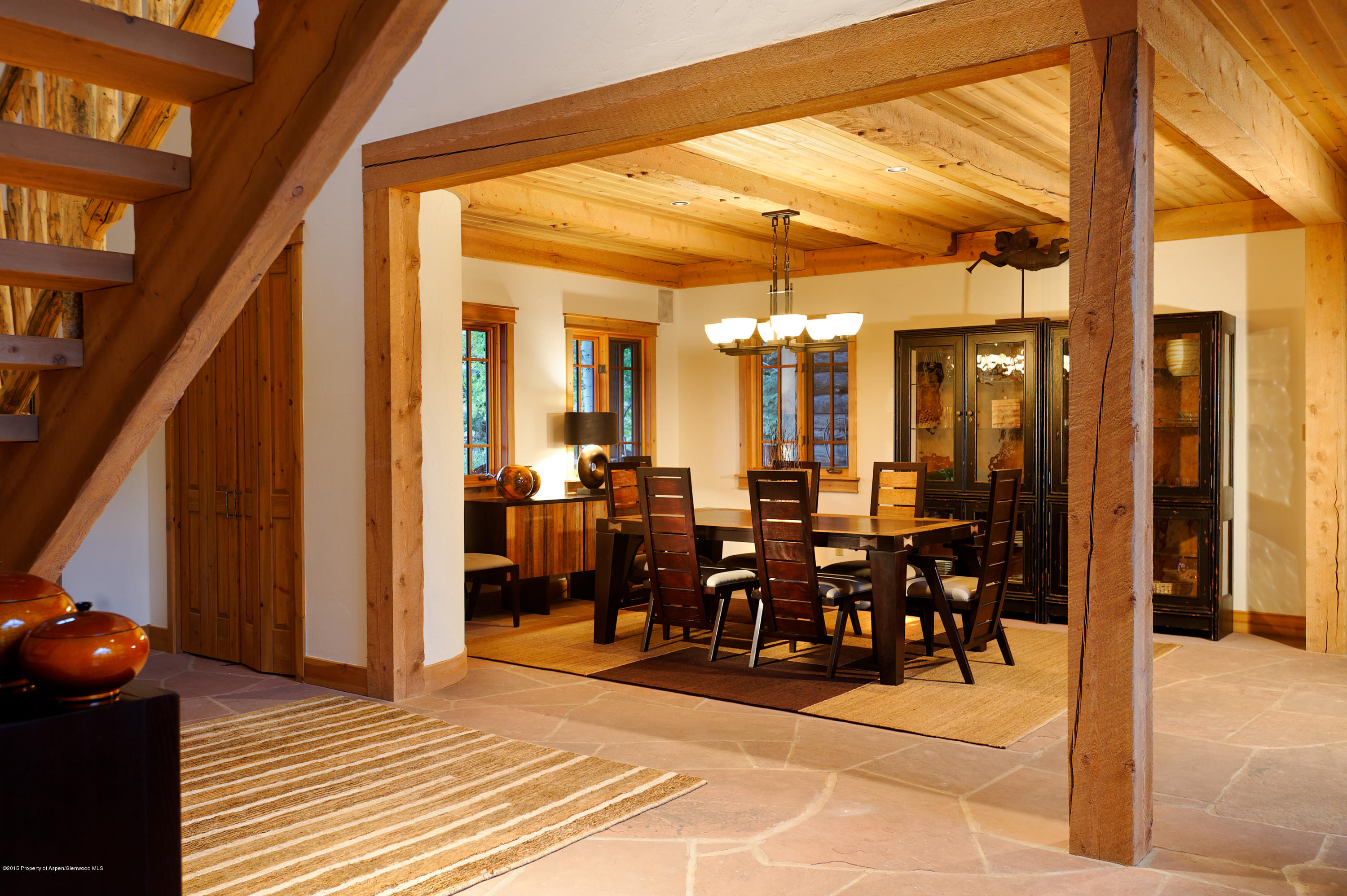 298 Red Rock Road Basalt, CO 81621 - Photo 17 of 30 a view of a dining room with furniture and chandelier