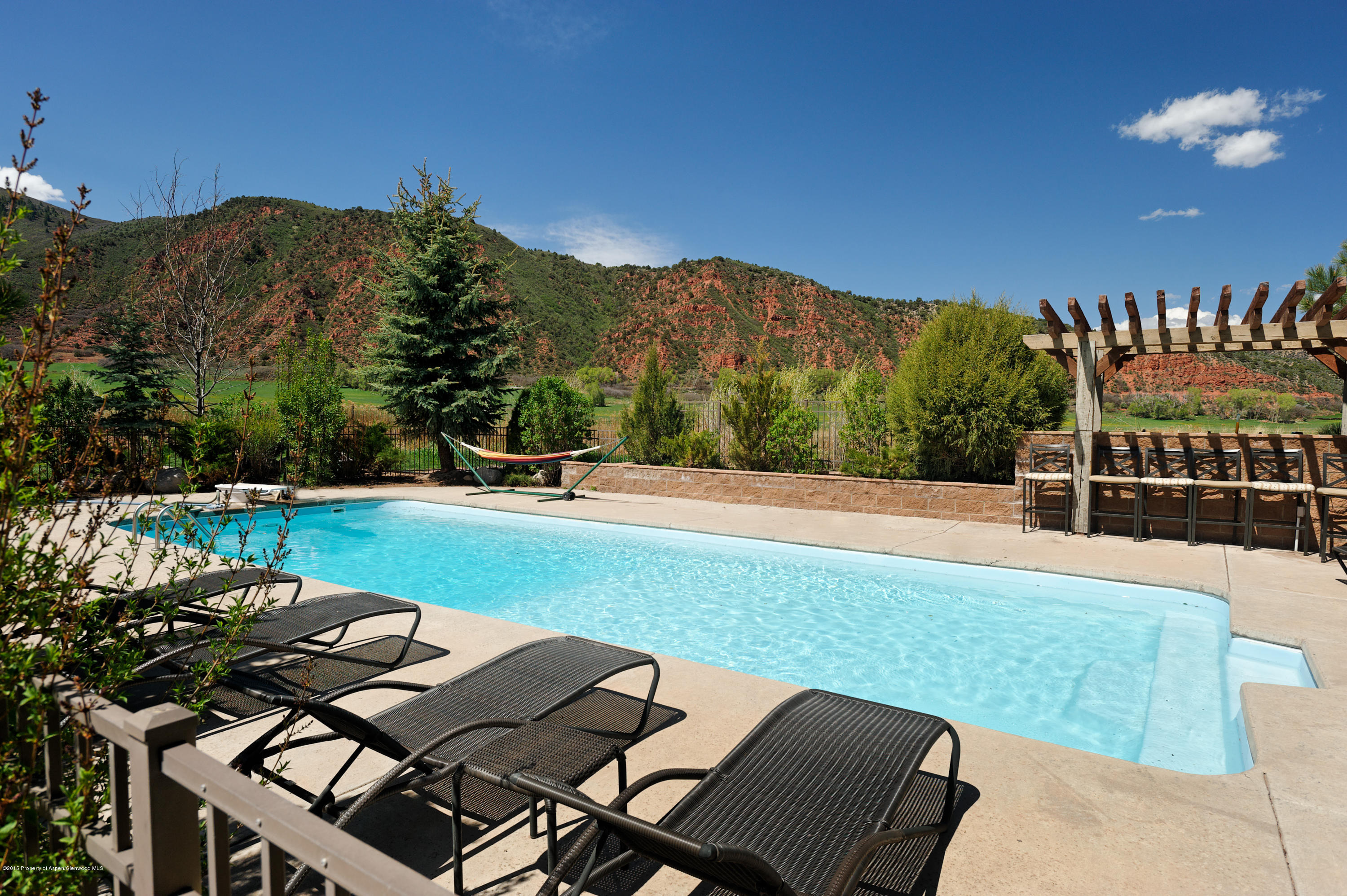 298 Red Rock Road Basalt, CO 81621 - Photo 8 of 30 a view of a chairs and table in the terrace