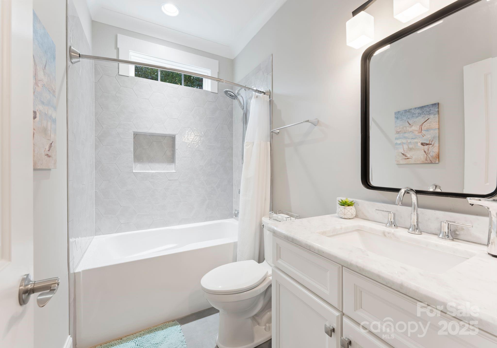 4275 Silver Eagle Cove Denver, NC 28037 - Photo 22 of 48 a bathroom with a sink toilet and shower