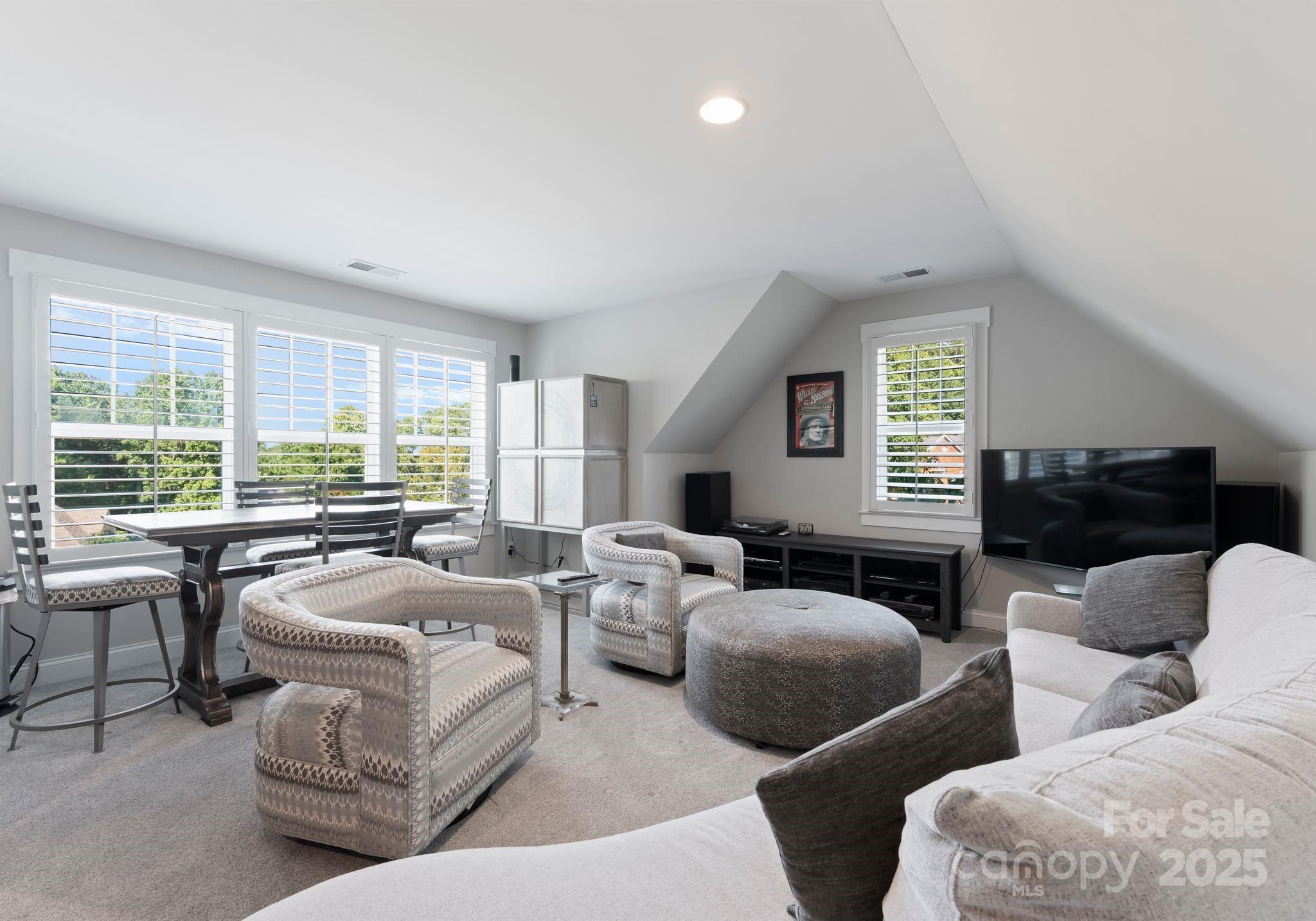 4275 Silver Eagle Cove Denver, NC 28037 - Photo 25 of 48 a living room with furniture and a large window