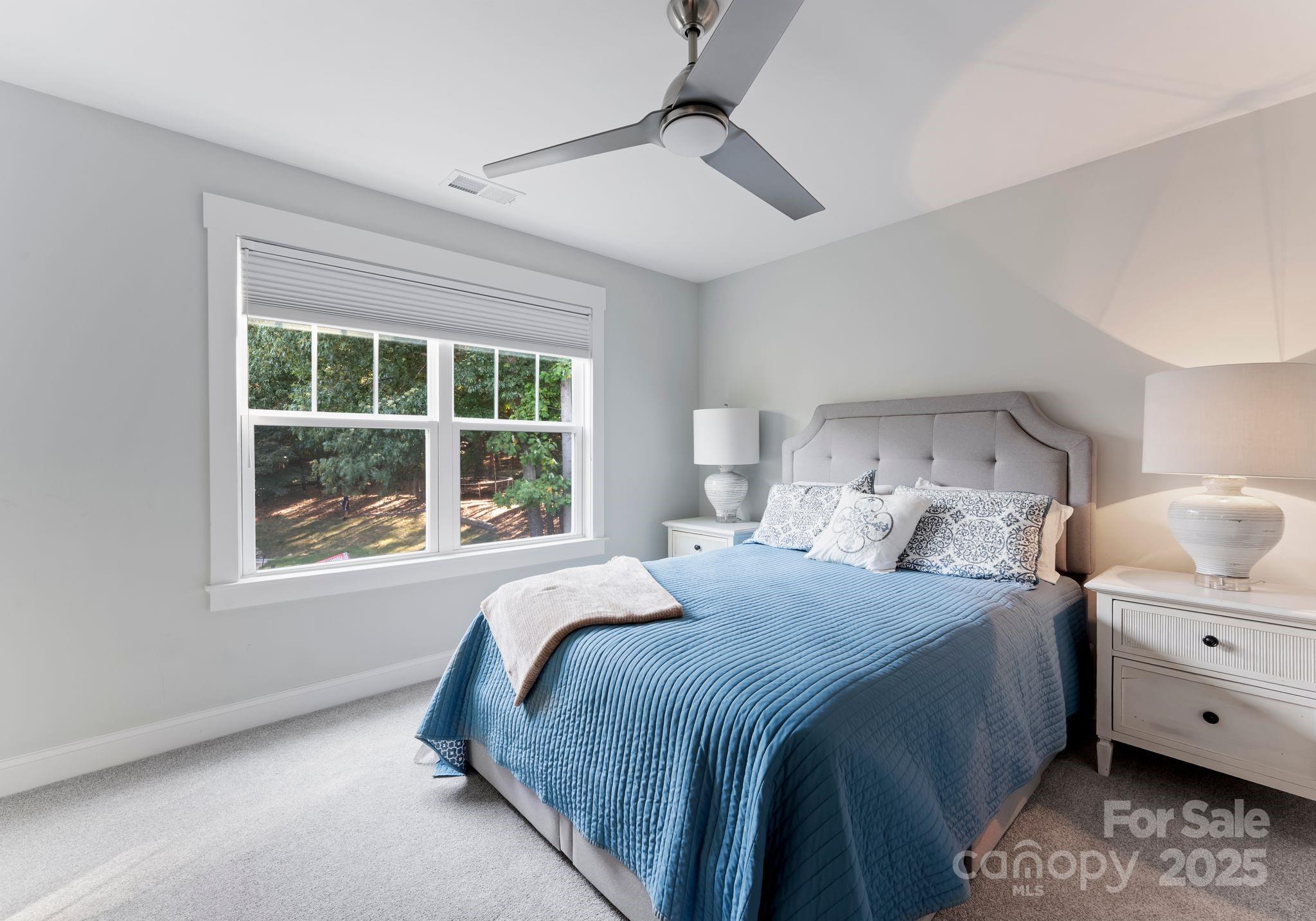 4275 Silver Eagle Cove Denver, NC 28037 - Photo 26 of 48 a bedroom with a bed and a window
