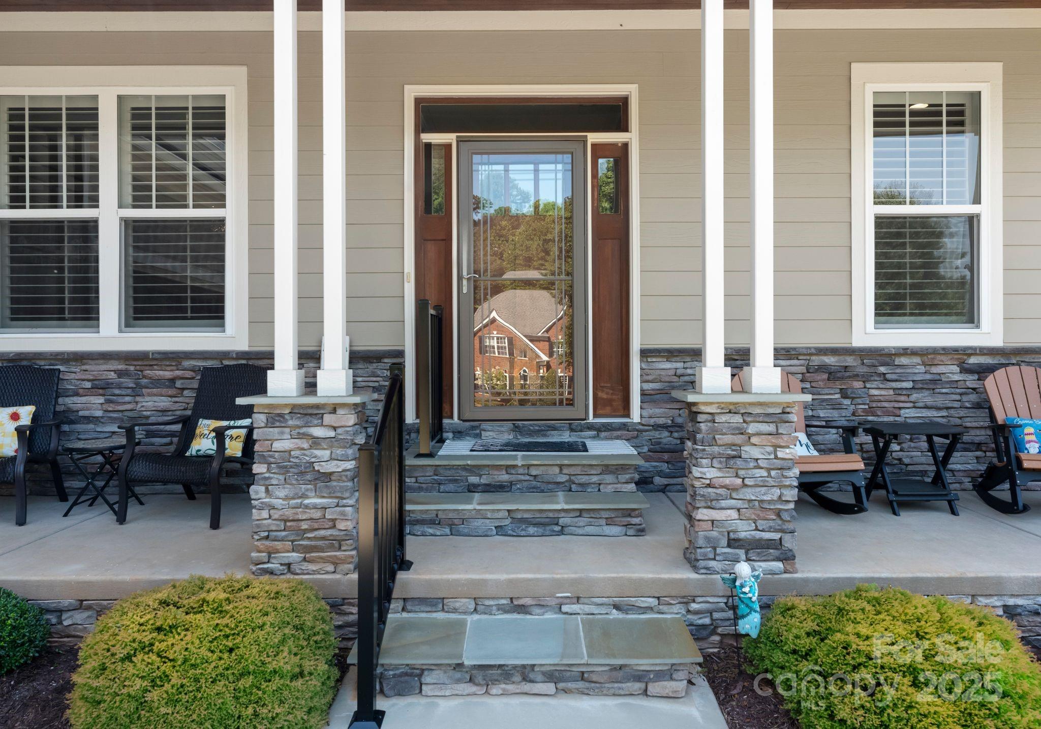 4275 Silver Eagle Cove Denver, NC 28037 - Photo 3 of 48 a front view of a house with a yard
