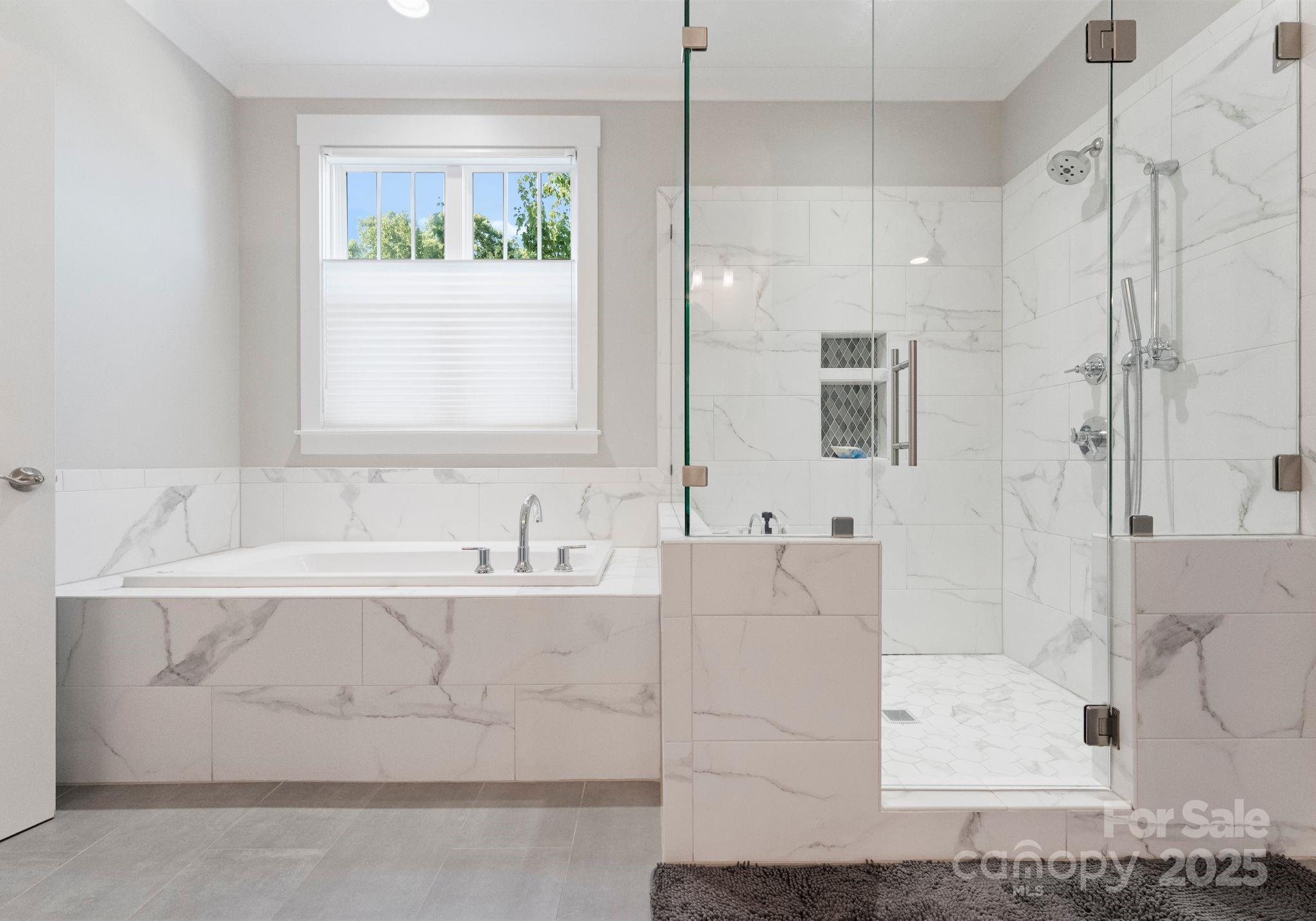 4275 Silver Eagle Cove Denver, NC 28037 - Photo 33 of 48 a bathroom with a bathtub and a sink