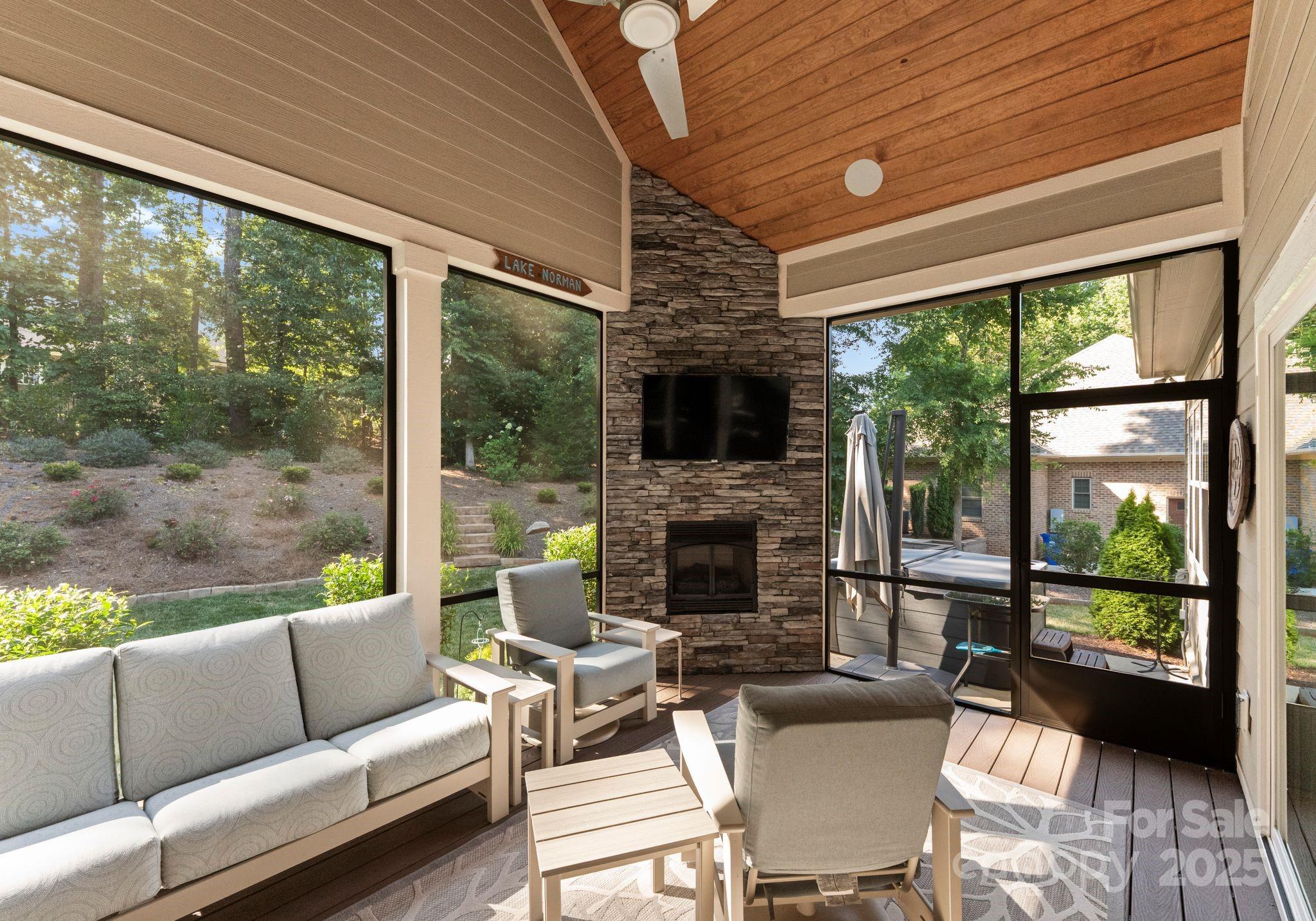 4275 Silver Eagle Cove Denver, NC 28037 - Photo 35 of 48 a living room with furniture and a fireplace