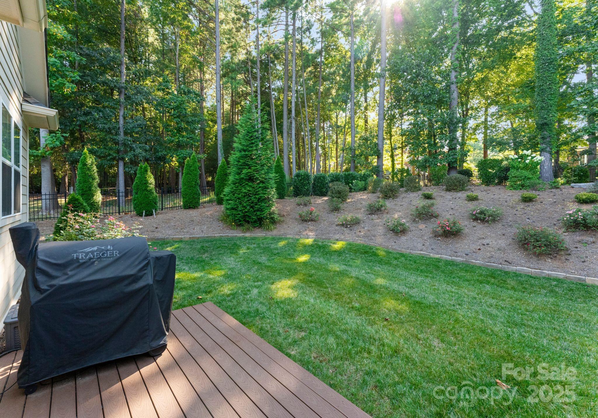 4275 Silver Eagle Cove Denver, NC 28037 - Photo 37 of 48 a view of a backyard with sitting area