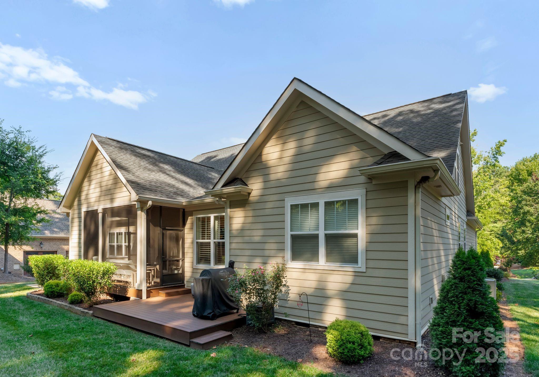 4275 Silver Eagle Cove Denver, NC 28037 - Photo 39 of 48 a view of a house with a yard and plants