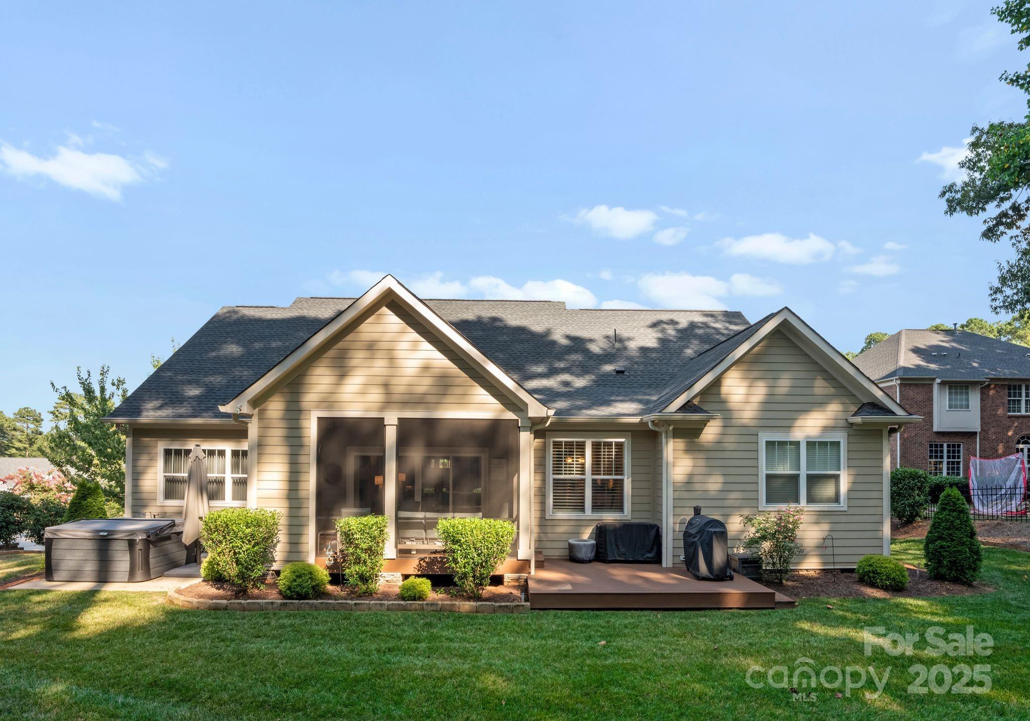 4275 Silver Eagle Cove Denver, NC 28037 - Photo 41 of 48 a front view of a house with a yard and porch
