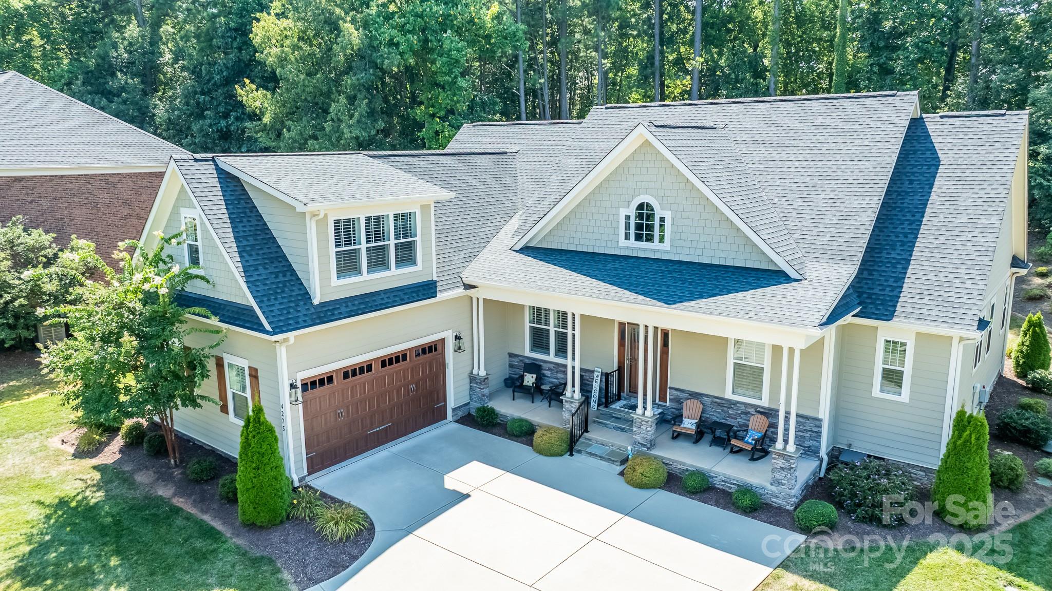 4275 Silver Eagle Cove Denver, NC 28037 - Photo 44 of 48 a aerial view of a house with a yard and potted plants