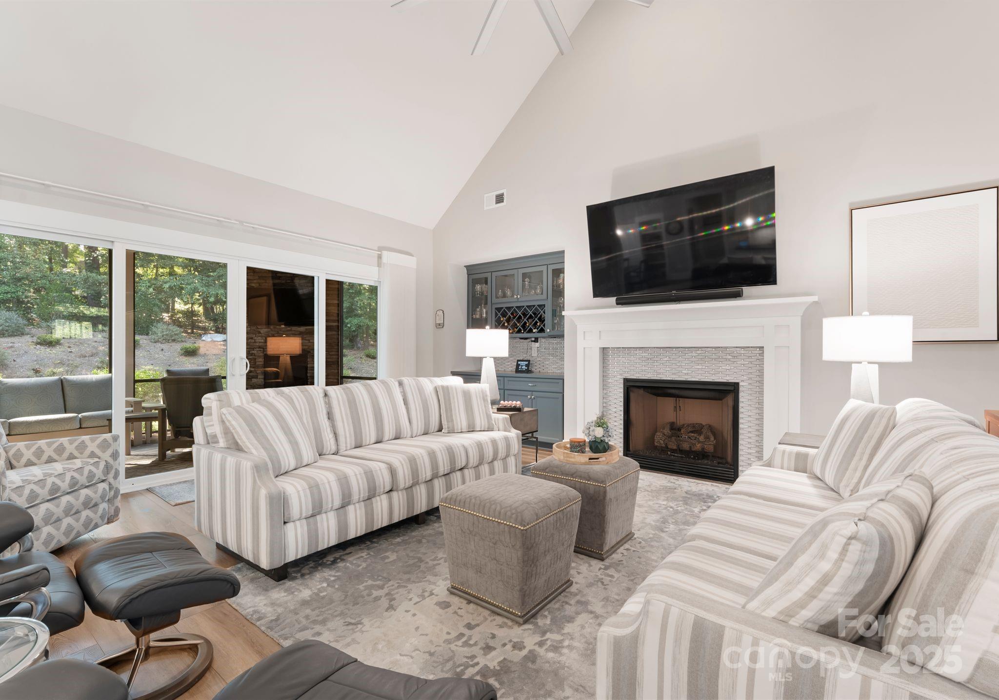 4275 Silver Eagle Cove Denver, NC 28037 - Photo 9 of 48 a living room with furniture fireplace and flat screen tv