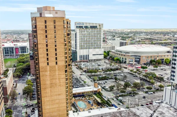 a view of a city with tall buildings