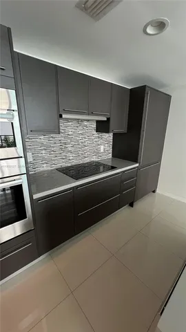 a large room with kitchen