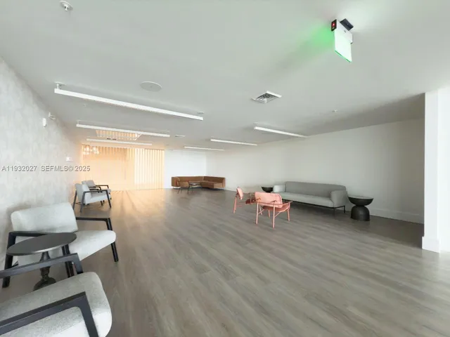 a backyard with table and chairs