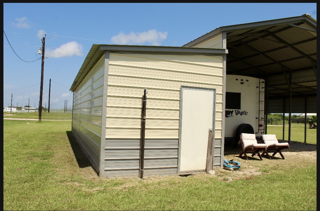 264 Haddock Palacios, TX 77465 - Photo 6 of 9 a view of a two chairs in the patio