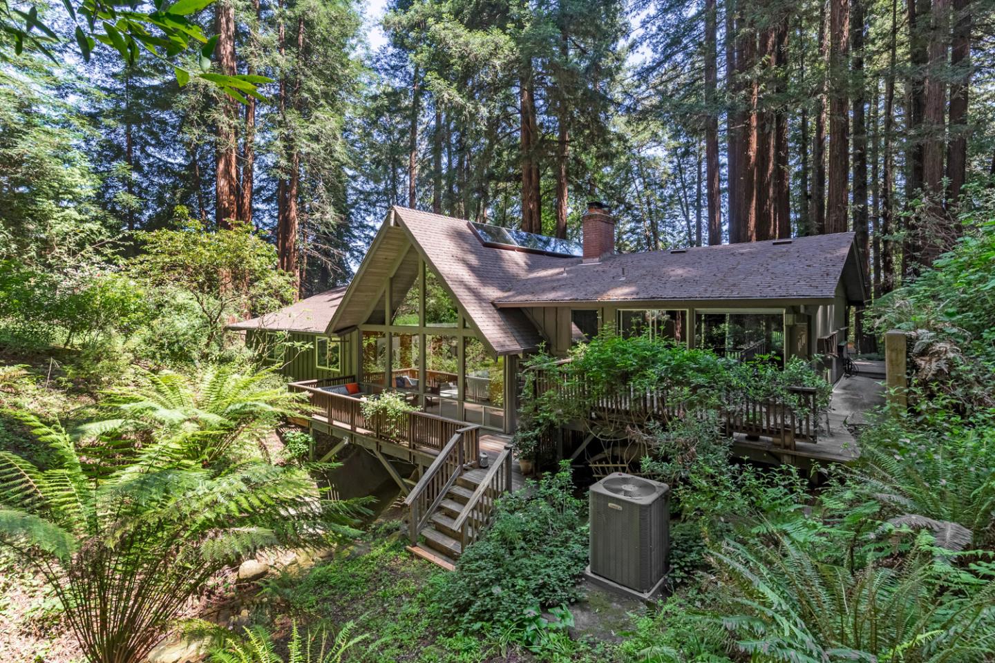 573 Patrol Road Woodside, CA 94062 - Photo 1 of 18 a view of a garden with sitting area
