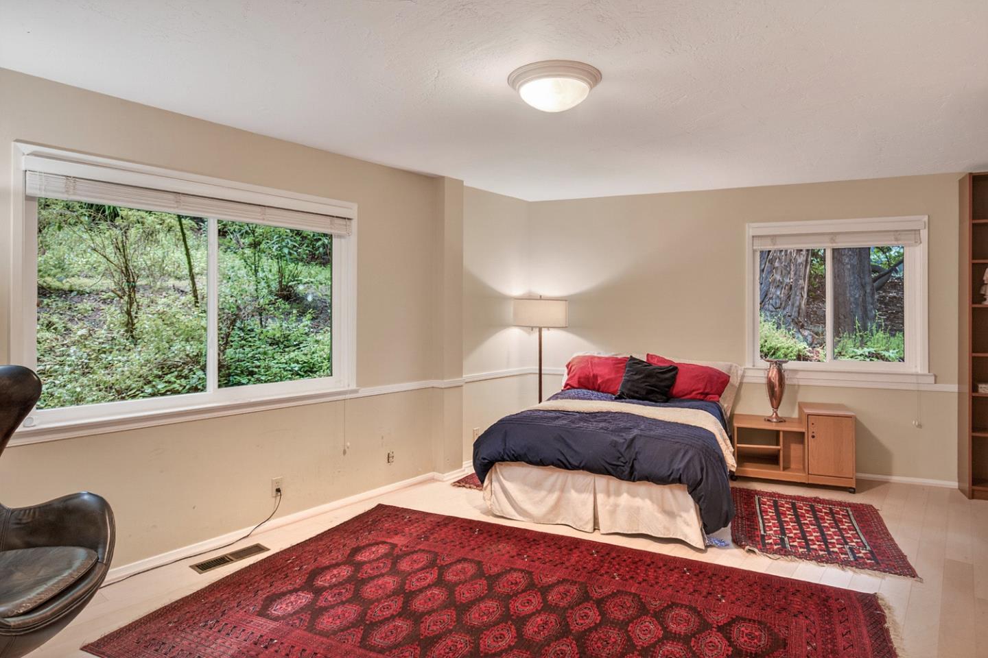 573 Patrol Road Woodside, CA 94062 - Photo 11 of 18 a bedroom with a bed and a window