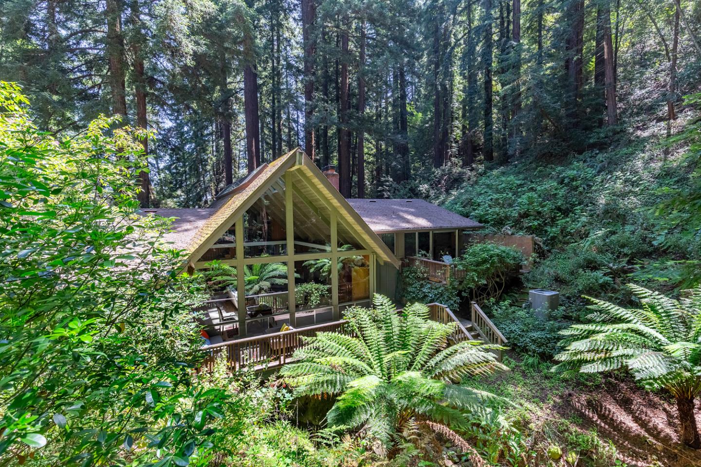 573 Patrol Road Woodside, CA 94062 - Photo 17 of 18 a backyard of a house with lots of green space