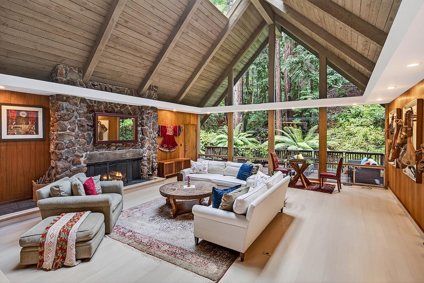573 Patrol Road Woodside, CA 94062 - Photo 2 of 18 a living room with furniture and a floor to ceiling window