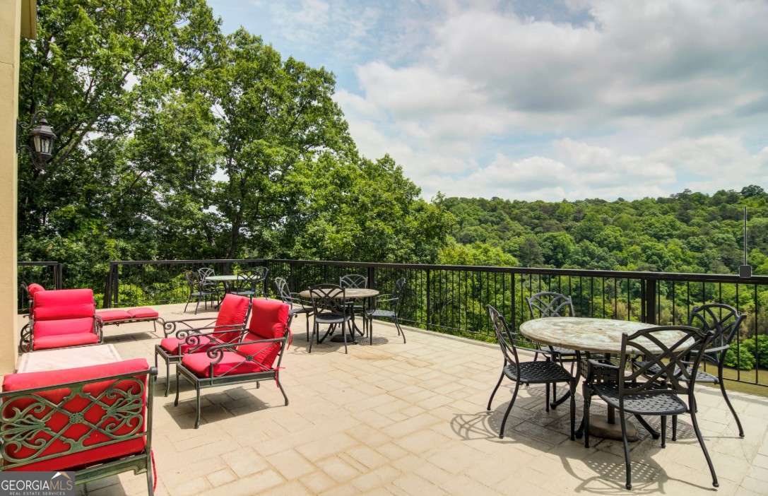 2383 Akers Mill Road Southeast, Unit L01 Atlanta, GA 30339 - Photo 14 of 30 an outdoor sitting area with furniture and garden